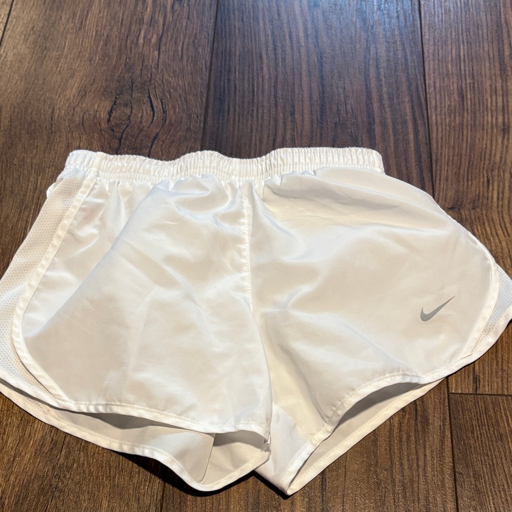 Nike Women's White Athletic Shorts with Gray Logo
